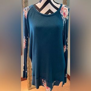Teal tunic with flower detailing